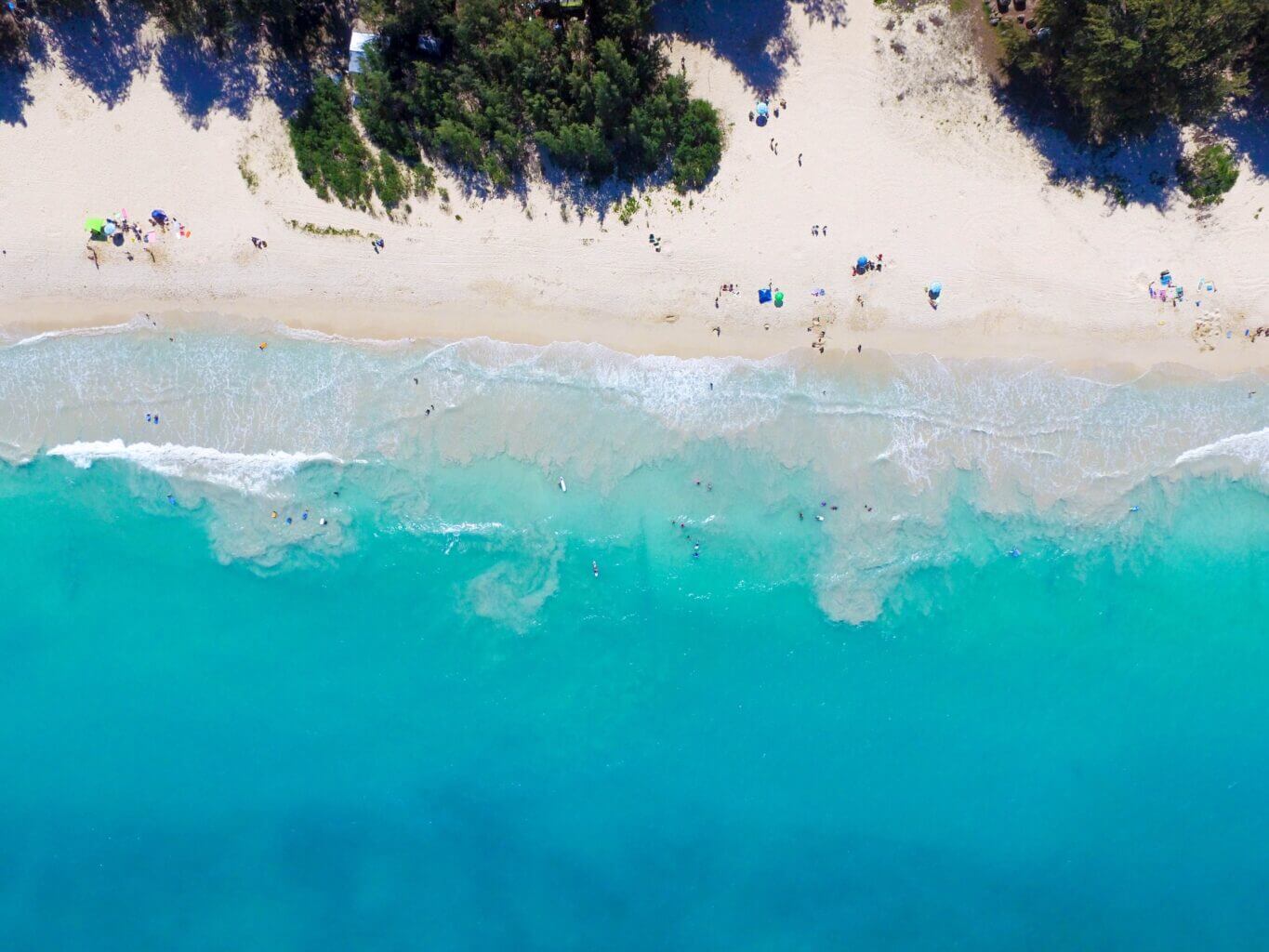 Arial View of Kailua Beach on Oahu, Hawaii. Known for their powdery white sand, this ranks as one of our top beaches on Oahu.