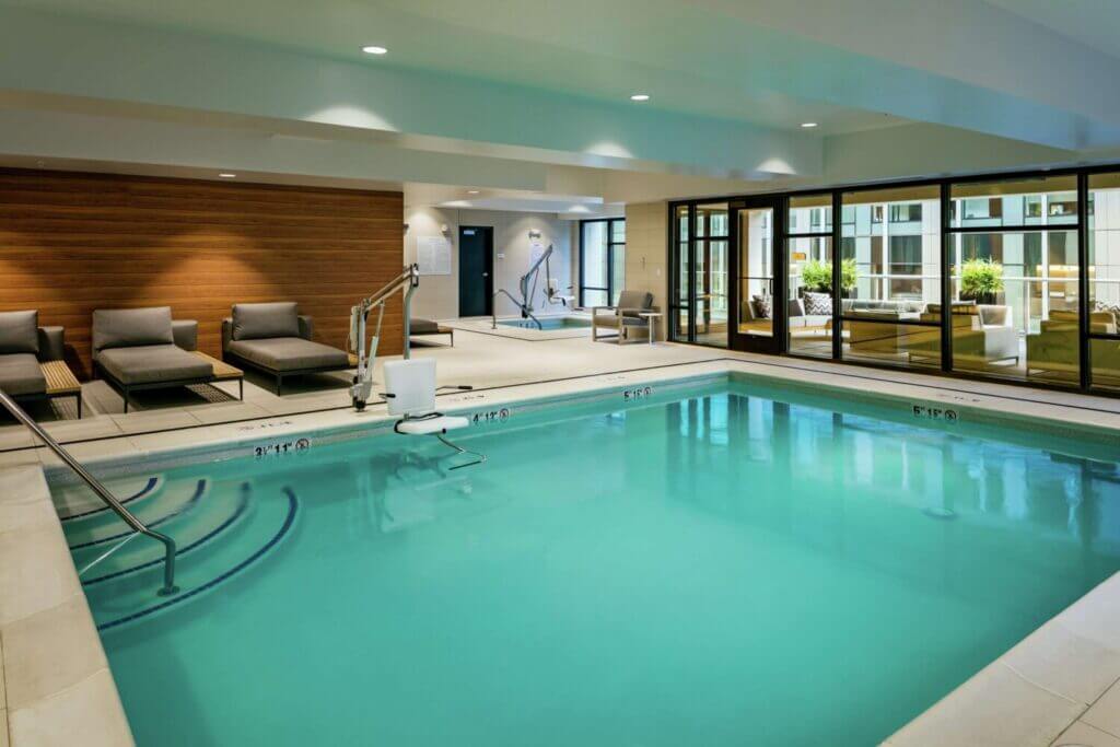 Indoor pool at the Hilton Garden Inn Bellevue, a family-friendly hotel near Seattle. This pool is perfect for kids to unwind after a day of exploring, offering a clean and bright space for families to swim and play.