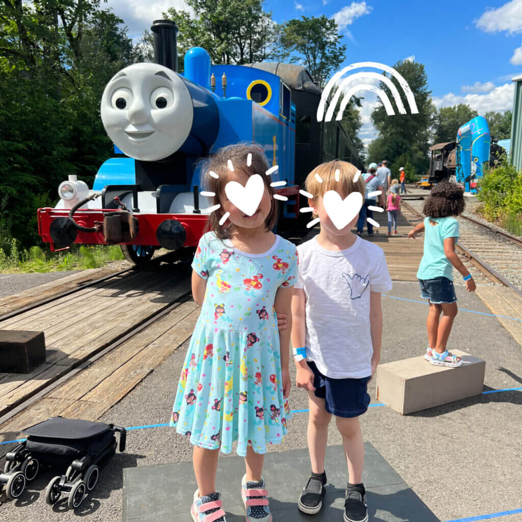 Northwest Railway Museum Day Out With Thomas, two kids taking photos in front of the train