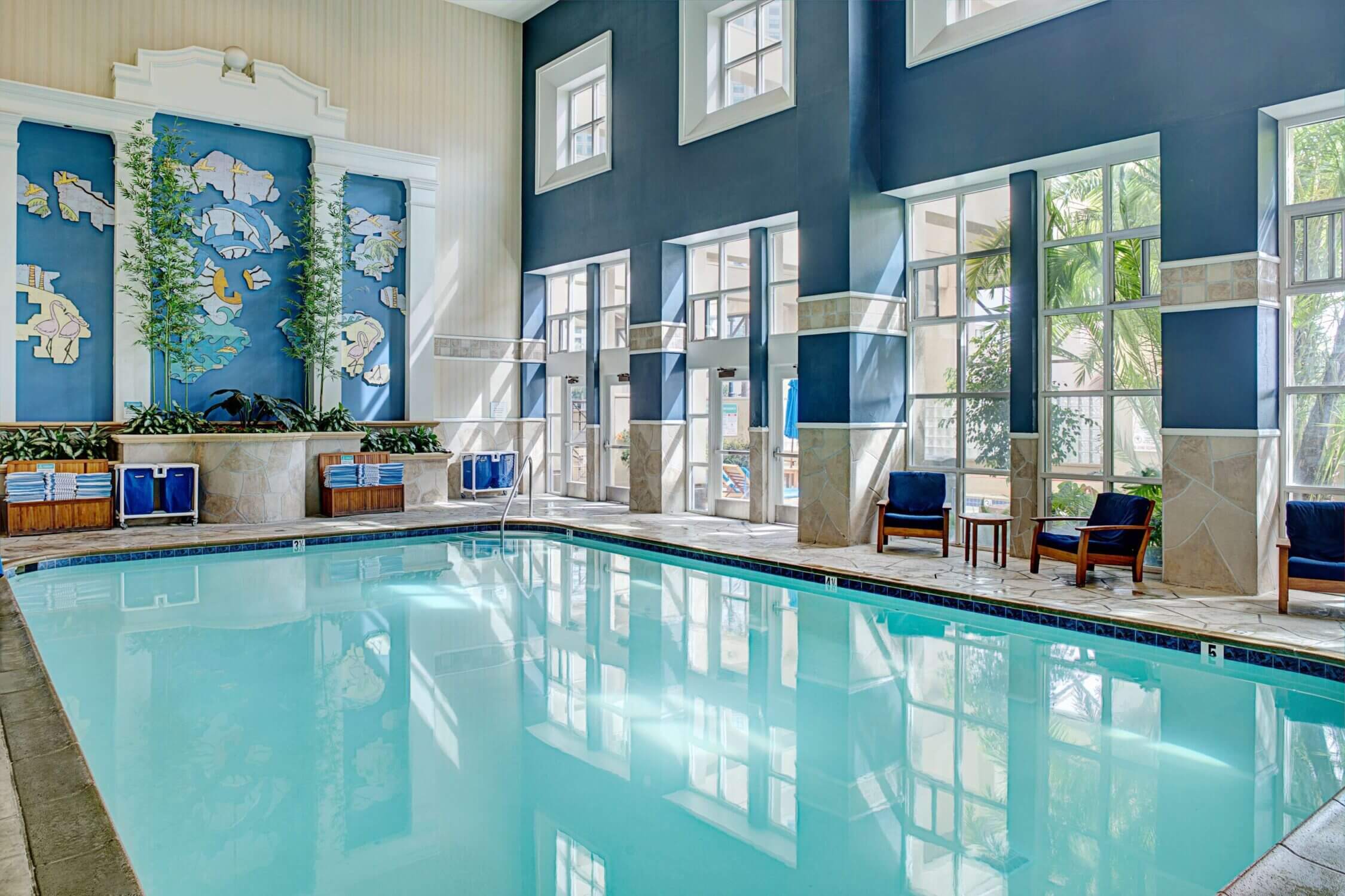 Embassy Suites San Diego features a spacious indoor swimming pool, perfect for families looking to relax and have fun during their stay. Kids can enjoy splashing in the warm, climate-controlled pool, while parents unwind in the nearby seating area.