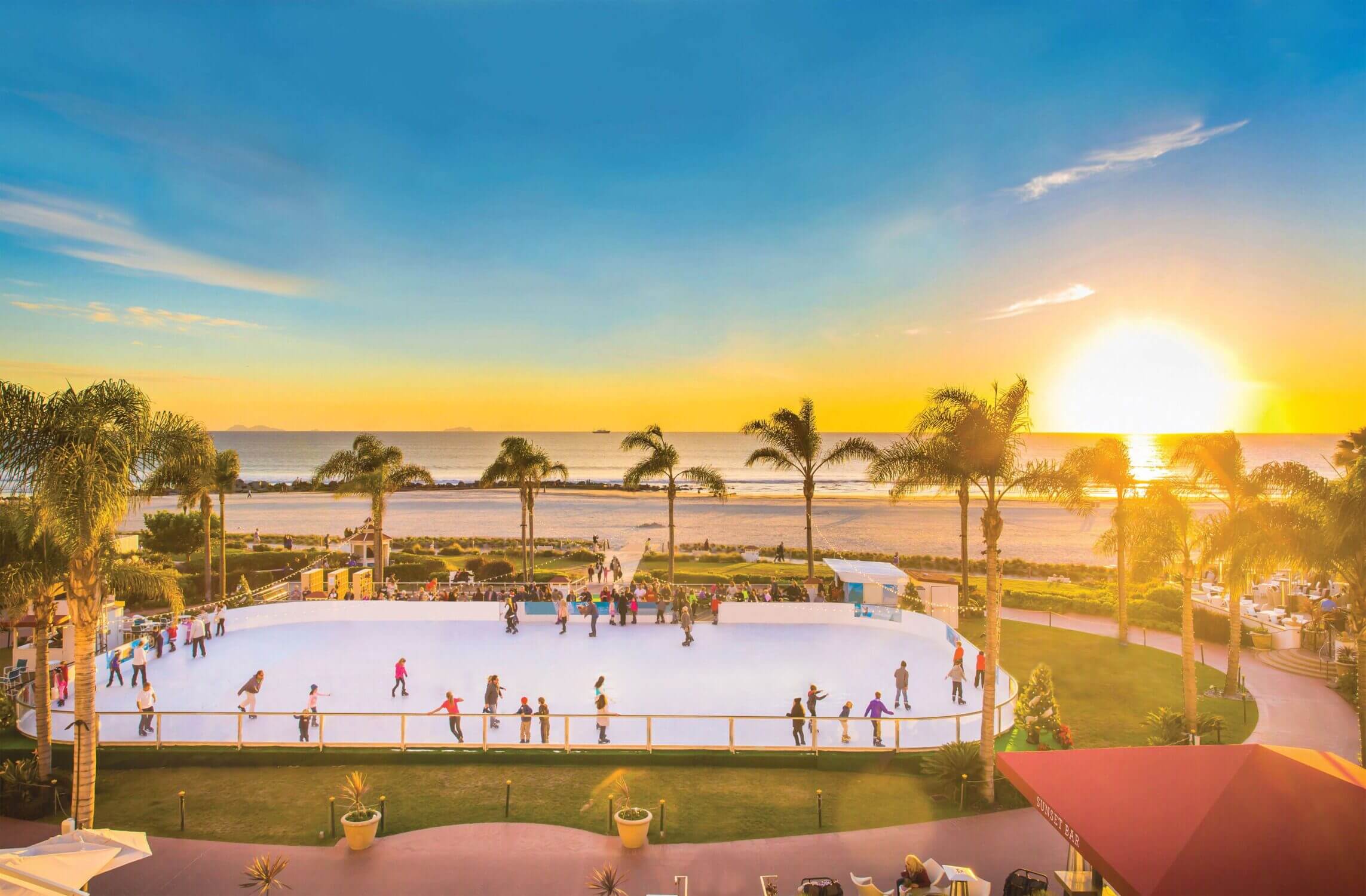Skating by the Sea at Hotel del Coronado, a must-do winter activity in San Diego. Visitors can take a spin around the famous beachfront ice rink with stunning ocean views.