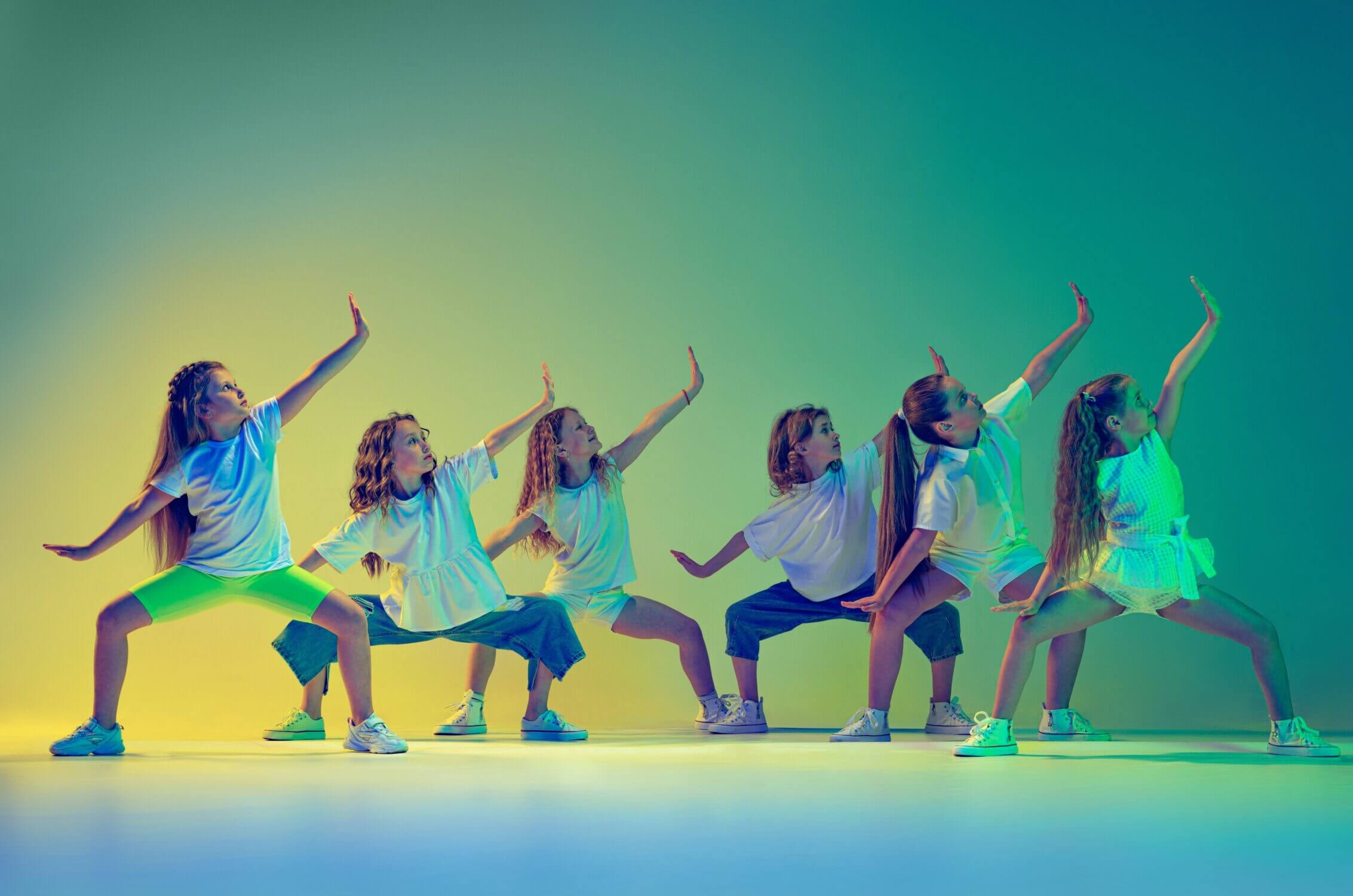 A group of kids dancing in a synchronized routine during a summer dance camp, showcasing coordination, rhythm, and teamwork. Dance camps are one of the top picks featured in our blog about the best summer camps in Seattle, Bellevue, and the surrounding areas. These camps offer children the chance to build confidence, stay active, and express creativity through movement. Whether it’s ballet, hip-hop, jazz, or musical theater, dance camps provide structured instruction in a fun and encouraging environment. They’re a great option for families looking for a summer activity that blends physical fitness with artistic expression.