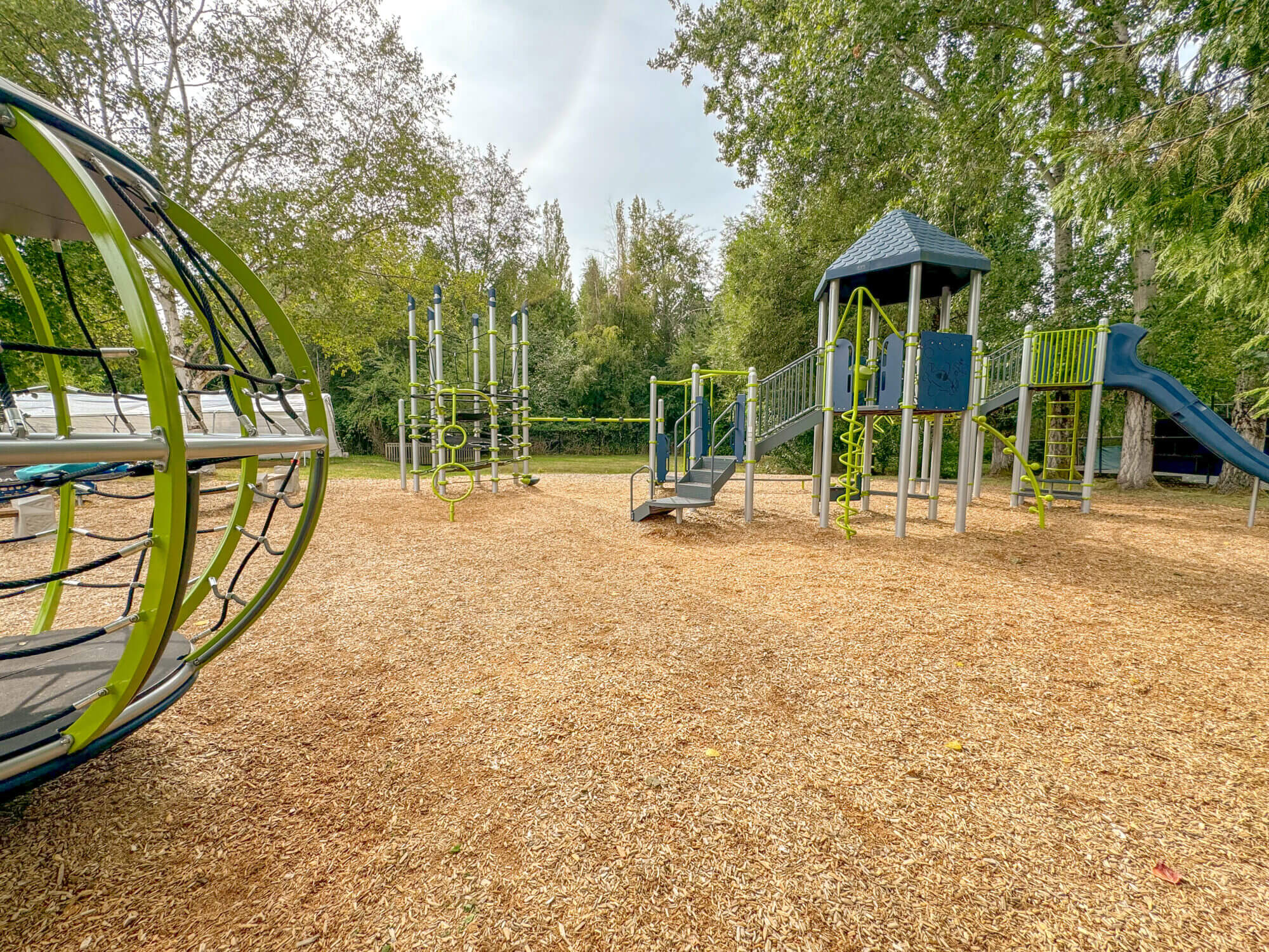 Samena Swim & Recreation Club in Bellevue features an outdoor playground, making it a perfect spot for summer camps and family fun. The playground provides a safe and engaging space for kids to climb, slide, and play between swim sessions and camp activities. Surrounded by greenery and located near both the indoor and outdoor pools, the playground adds extra variety to the daily schedule at Samena’s summer camp. It’s a great place for Bellevue kids to enjoy fresh air, make friends, and burn off energy in a fun and supervised setting.