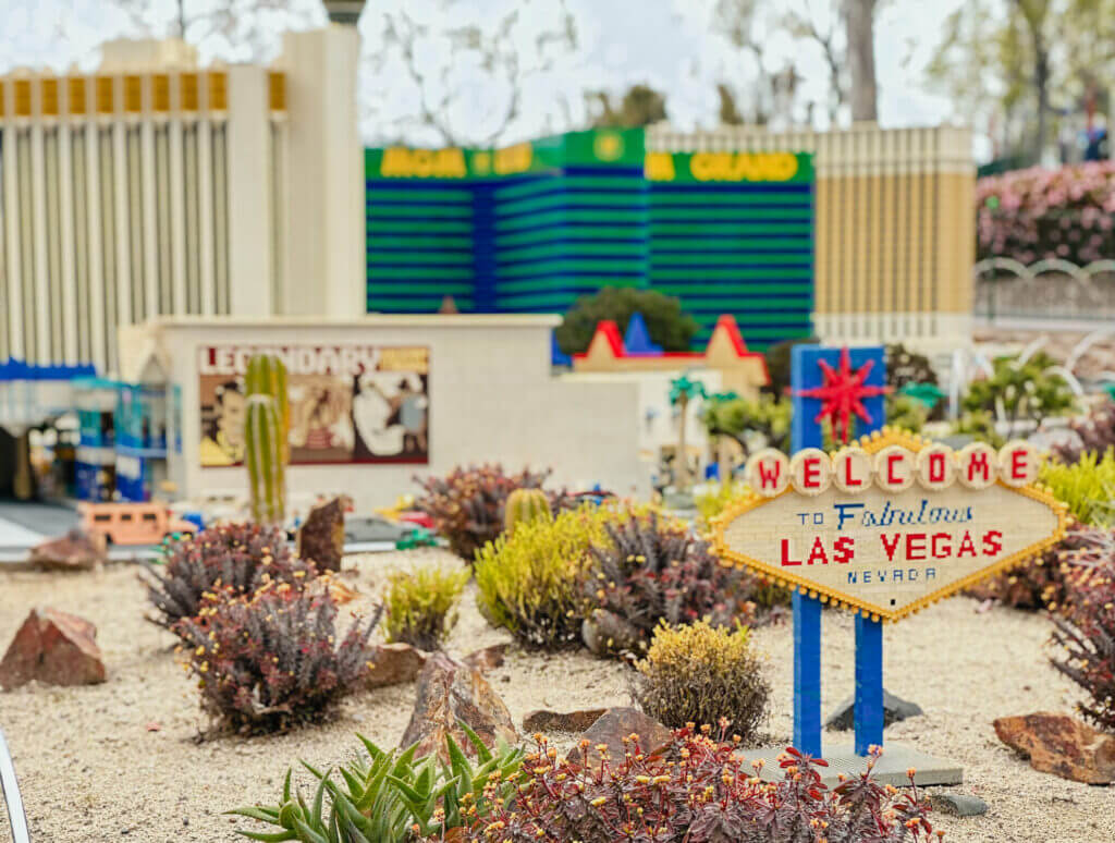 Close-up of the ‘Welcome to Las Vegas’ sign made entirely of LEGO bricks in the Miniland USA section of LEGOLAND California. Miniland USA features impressively detailed miniature replicas of iconic American cities and landmarks built from millions of LEGO pieces, offering a fun and educational experience for kids and adults alike