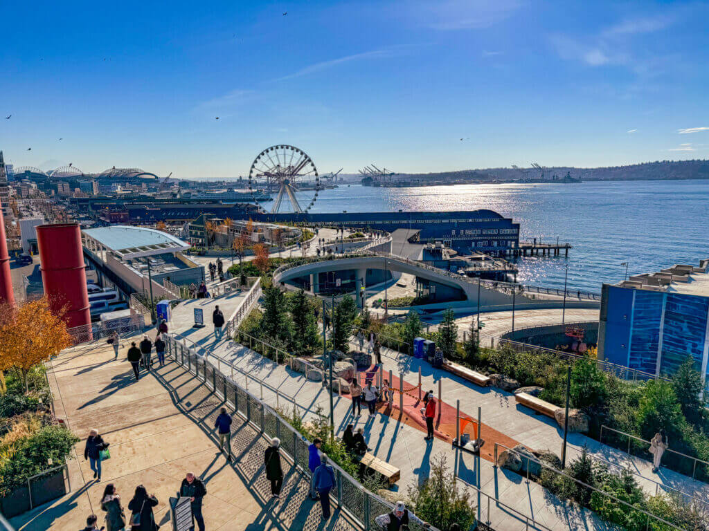 Newly renovated walking path connecting Pike Place Market to the Seattle waterfront, featuring a small modern playground where kids can take a break and play—an easy and scenic stroll for families visiting the city.